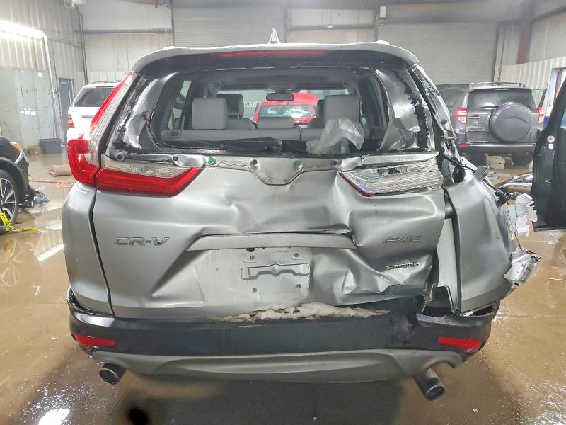Photo 6 from auction – 2018 HONDA CR-V TOURI with VIN 7FARW2H97JE070753