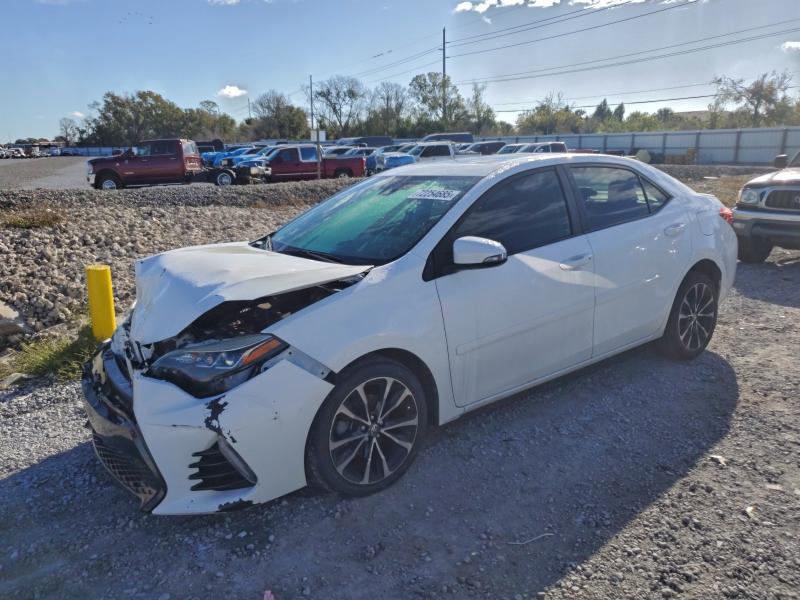 TOYOTA COROLLA L 2017 with VIN 2T1BURHEXHC769947 - Photo from auction