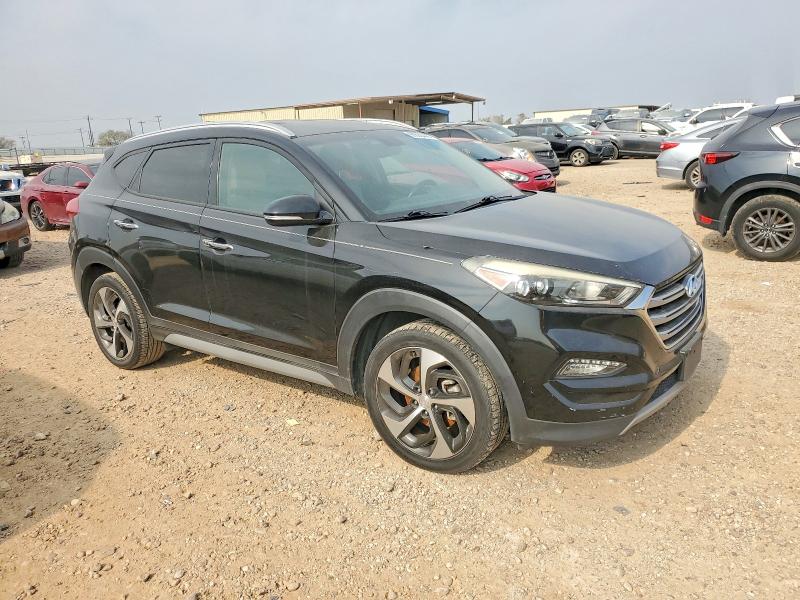 Photo 4 from auction – 2017 HYUNDAI TUCSON LIM with VIN KM8J33A28HU488613