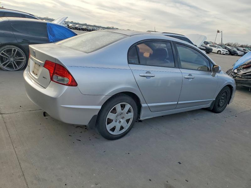 Photo 3 from auction – 2010 HONDA CIVIC LX with VIN 2HGFA1F53AH315924