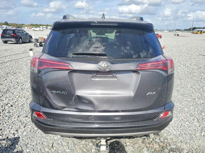 Photo 6 from auction – 2016 TOYOTA RAV4 XLE with VIN JTMWFREV6GJ063335