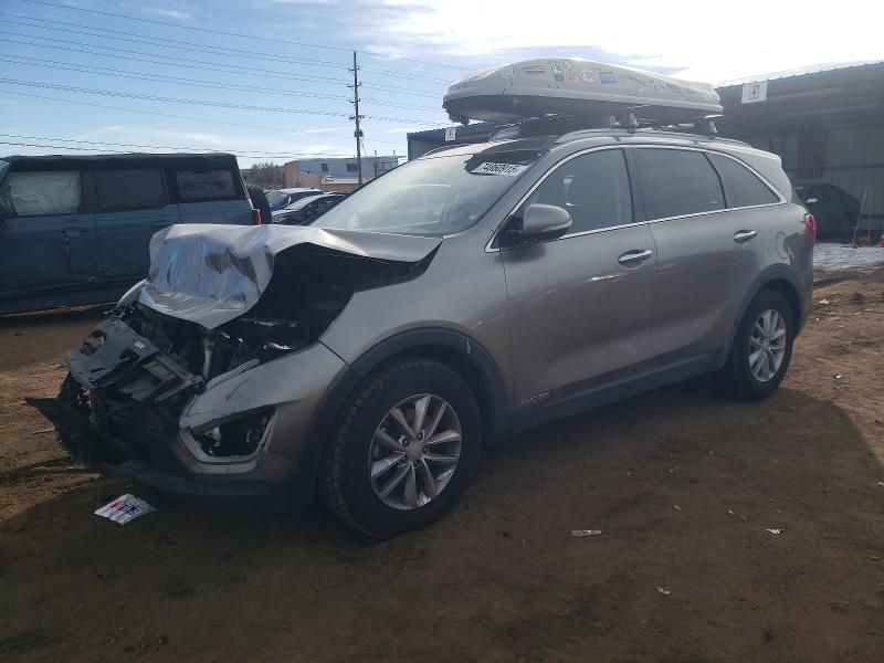 KIA SORENTO LX 2018 with VIN 5XYPGDA51JG408689 - Photo from auction