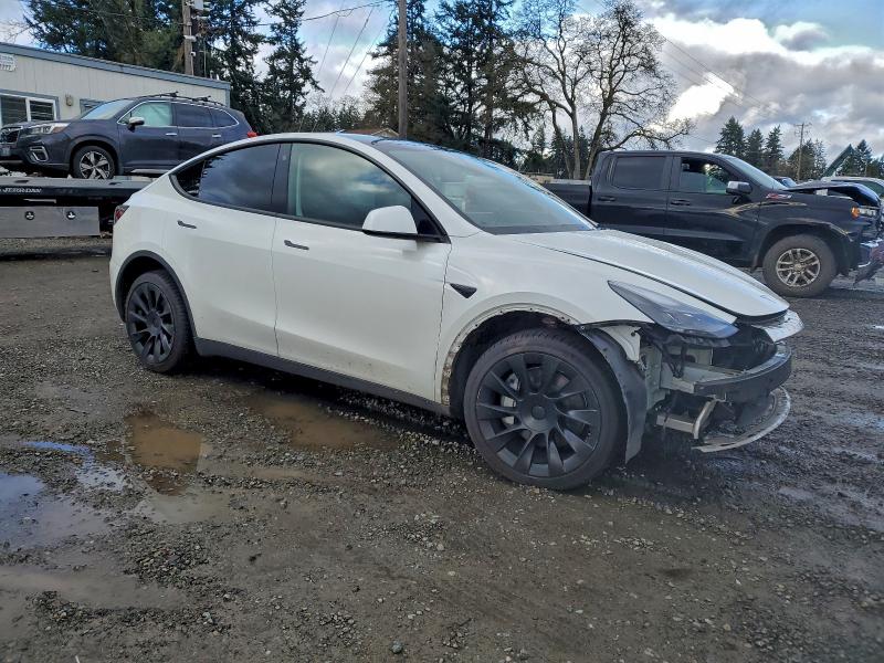 Photo 4 from auction – 2023 TESLA MODEL Y with VIN 7SAYGDEE5PF676243