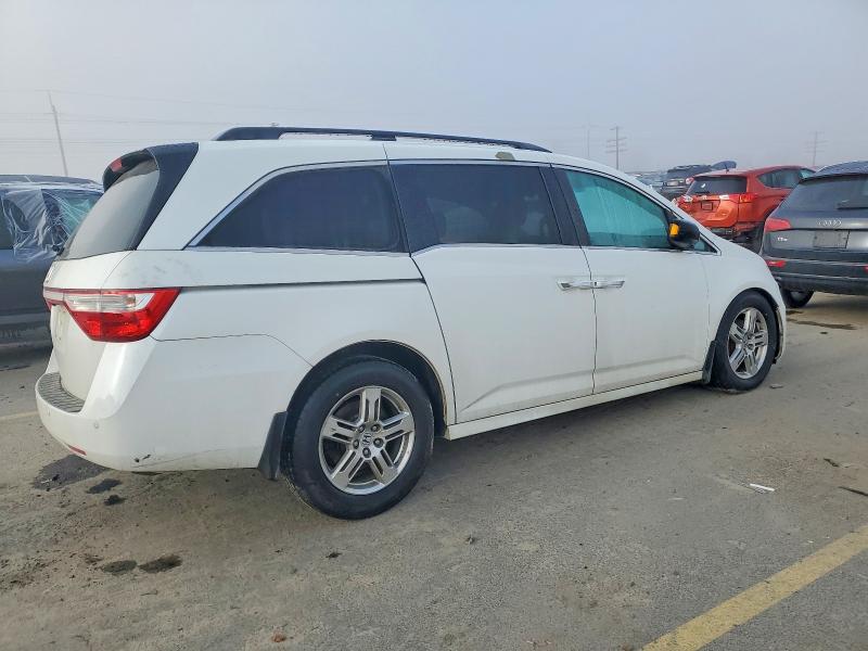 Photo 3 from auction – 2012 HONDA ODYSSEY TO with VIN 5FNRL5H98CB071578