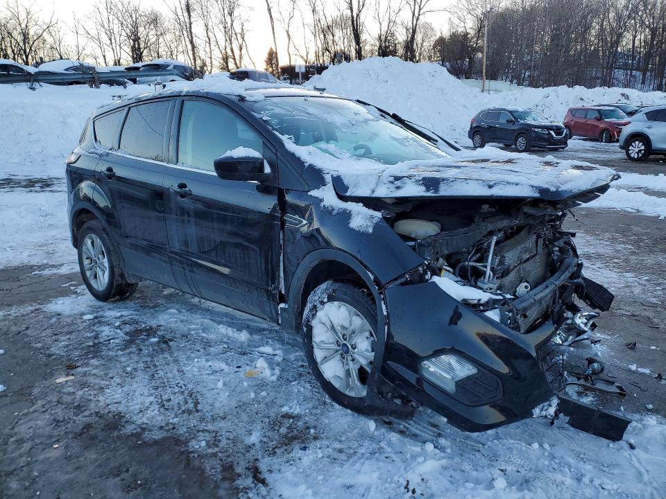 Photo 4 from auction – 2017 FORD ESCAPE with VIN 1FMCU9GD8HUE00578