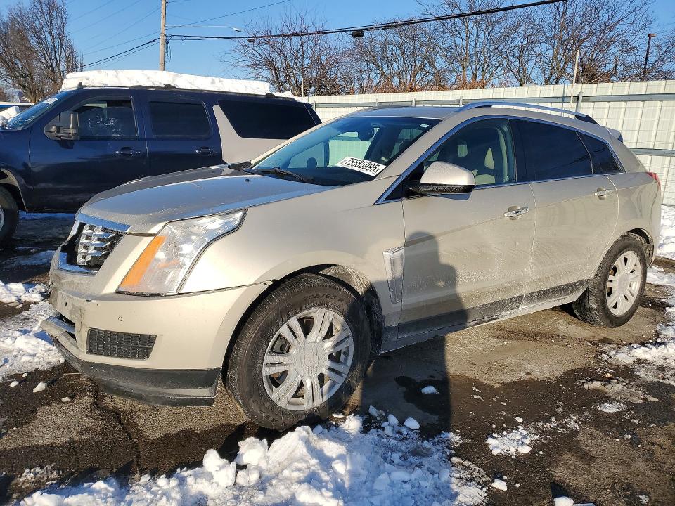 CADILLAC SRX LUXURY 2015 with VIN 3GYFNEE38FS640593 - Photo from auction