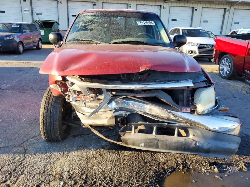 Photo 5 from auction – 2003 FORD F150 with VIN 1FTRW076X3KD32049