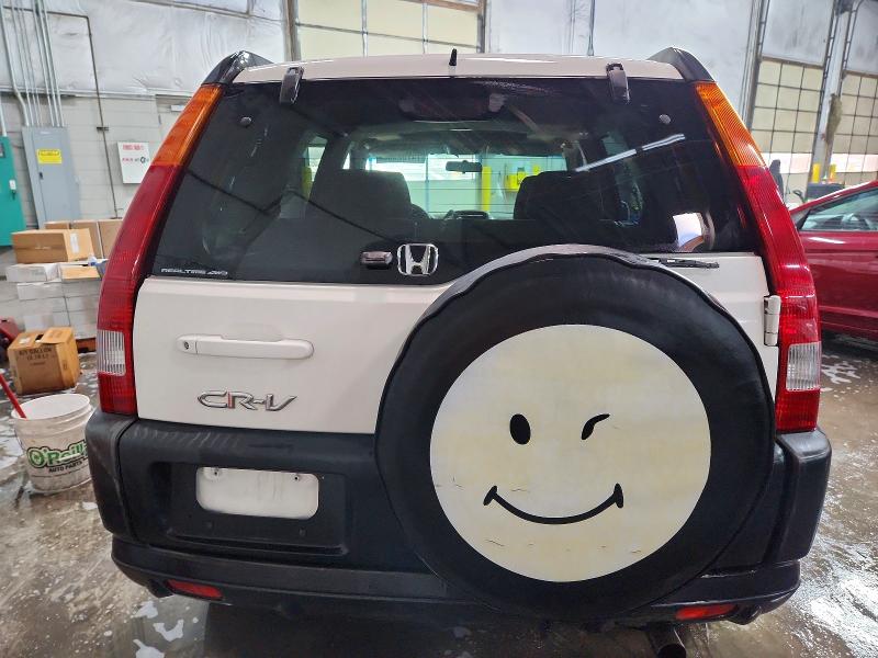 Photo 6 from auction – 2002 HONDA CR-V EX with VIN JHLRD788X2C061486