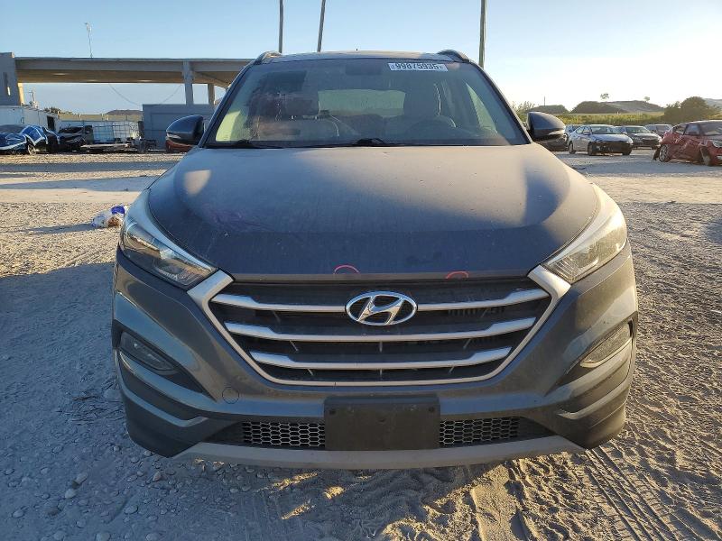 Photo 5 from auction – 2017 HYUNDAI TUCSON LIM with VIN KM8J3CA26HU555158