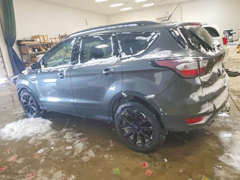 Photo 2 from auction – 2017 FORD ESCAPE with VIN 1FMCU9J96HUE77485