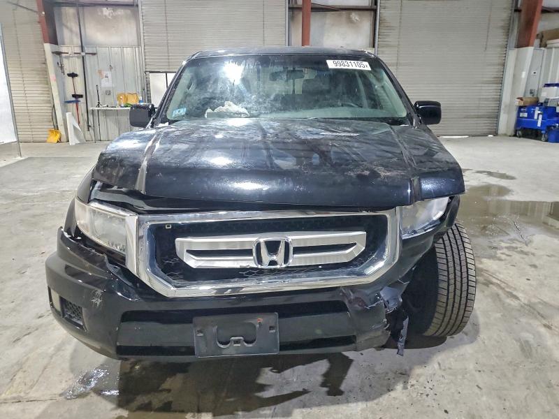 Photo 5 from auction – 2010 HONDA RIDGELINE with VIN 5FPYK1F48AB008192
