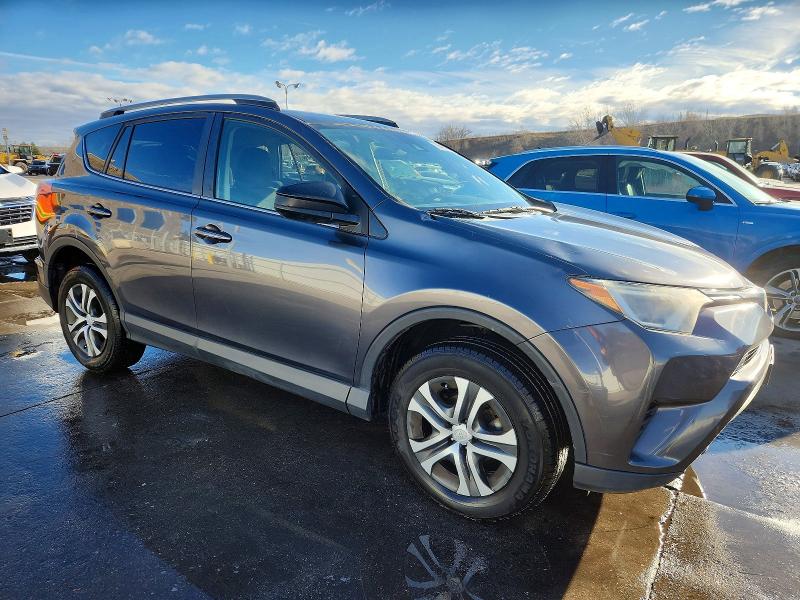 Photo 4 from auction – 2017 TOYOTA RAV4 LE with VIN JTMBFREVXHJ709718