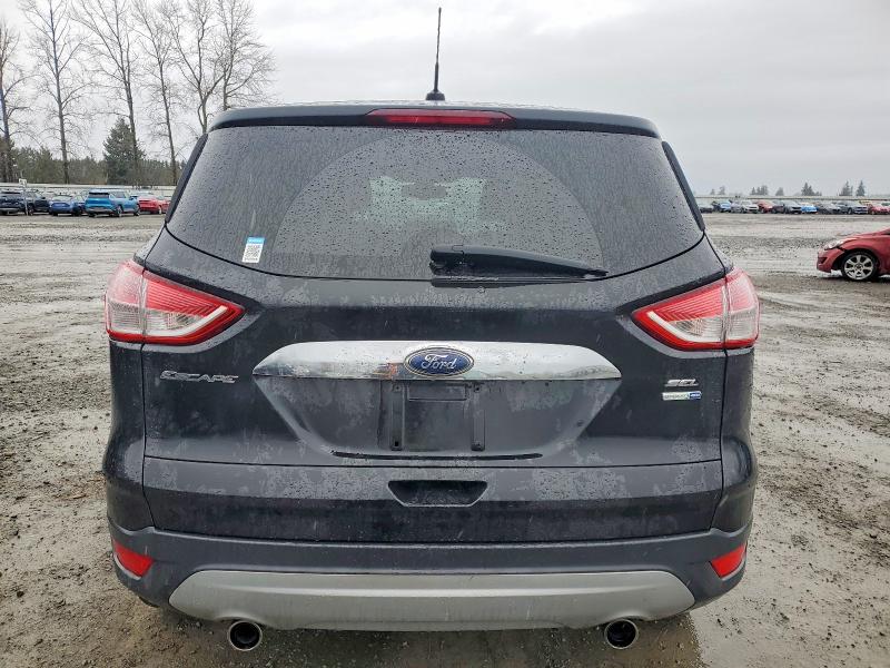 Photo 6 from auction – 2013 FORD ESCAPE with VIN 1FMCU9H91DUB86084