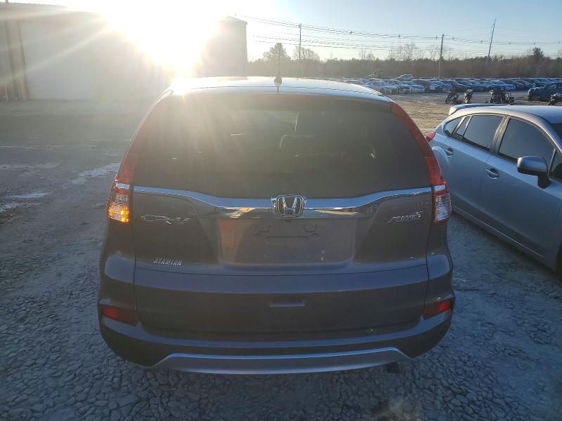 Photo 6 from auction – 2015 HONDA CR-V EX with VIN 2HKRM4H55FH619580