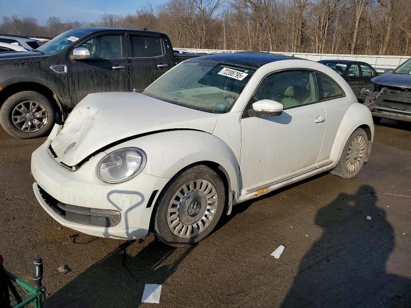 VOLKSWAGEN BEETLE 2014 with VIN 3VWJ17AT4EM657856 - Photo from auction