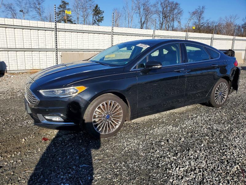 FORD FUSION TIT 2017 with VIN 3FA6P0D92HR211264 - Photo from auction