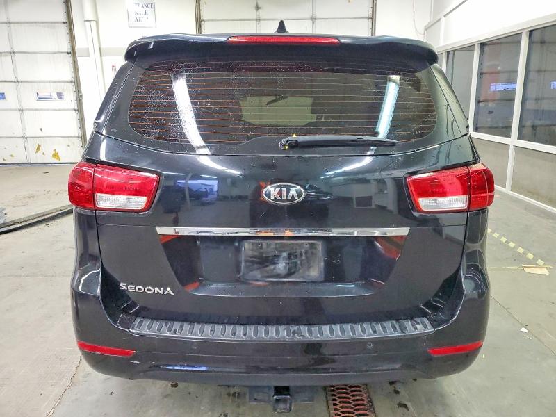Photo 6 from auction – 2015 KIA SEDONA L with VIN KNDMA5C12F6041378