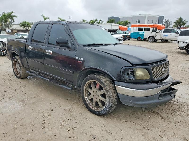 Photo 4 from auction – 2001 FORD F150 with VIN 1FTRW07L21KC60105