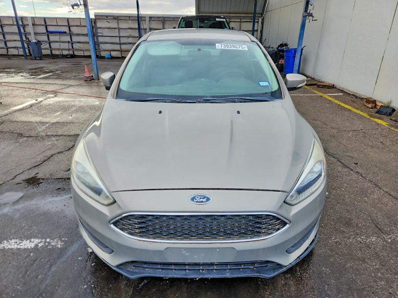 Photo 5 from auction – 2016 FORD FOCUS with VIN 1FADP3F25GL305791