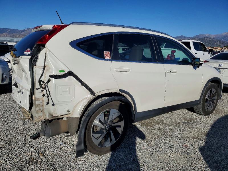 Photo 3 from auction – 2016 HONDA CR-V TOURI with VIN 5J6RM3H99GL016717