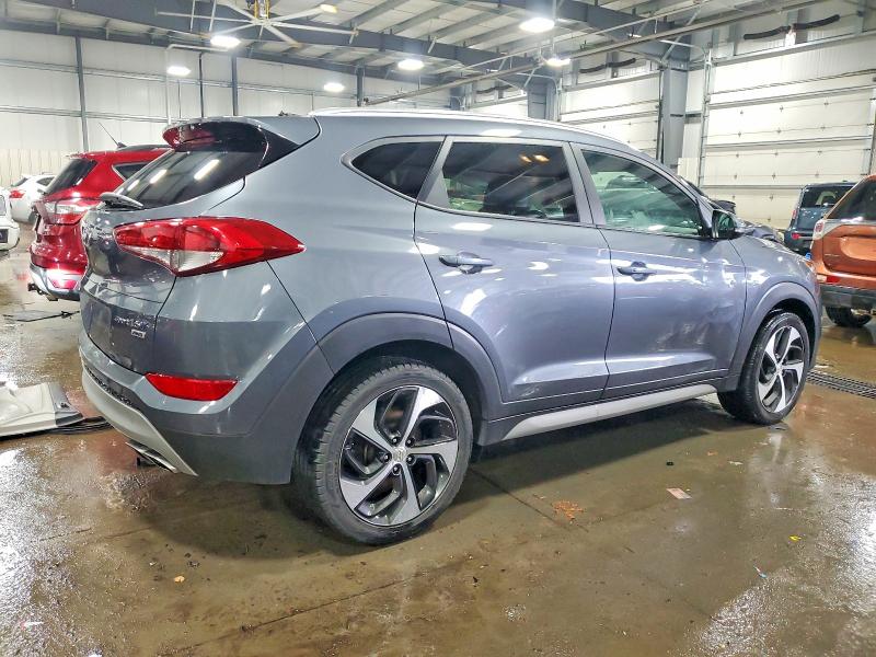 Photo 3 from auction – 2017 HYUNDAI TUCSON LIM with VIN KM8J3CA21HU502402