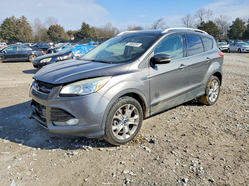 FORD ESCAPE TIT 2014 with VIN 1FMCU9JXXEUB94016 - Photo from auction