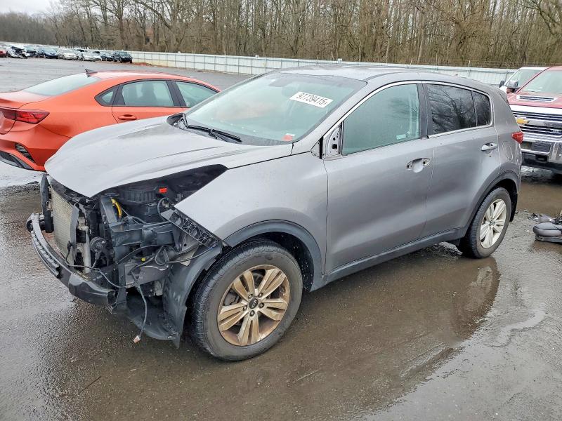 KIA SPORTAGE L 2019 with VIN KNDPMCAC0K7554162 - Photo from auction