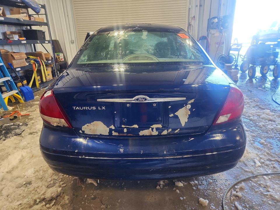 Photo 6 from auction – 2001 FORD TAURUS LX with VIN 1FAFP52211G223602