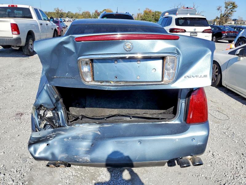 Photo 6 from auction – 2000 CADILLAC DEVILLE with VIN 1G6KD54Y5YU297297