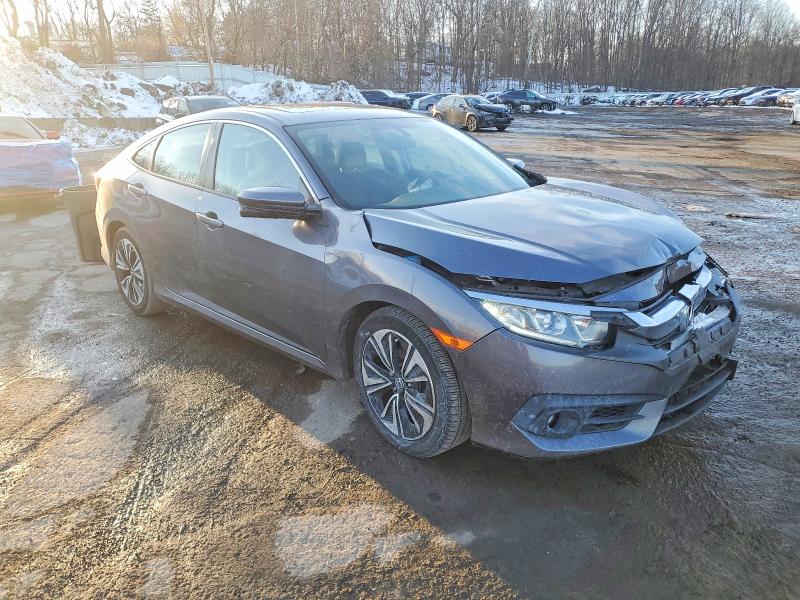 Photo 4 from auction – 2018 HONDA CIVIC EX with VIN 2HGFC1F3XJH641129