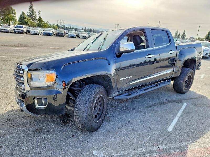 GMC CANYON SLT 2015 with VIN 1GTG5CE35F1243147 - Photo from auction