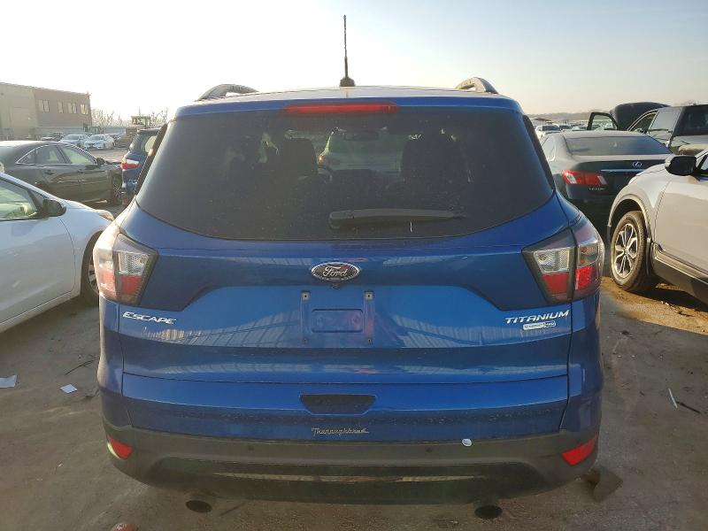 Photo 6 from auction – 2017 FORD ESCAPE with VIN 1FMCU9J94HUA38690