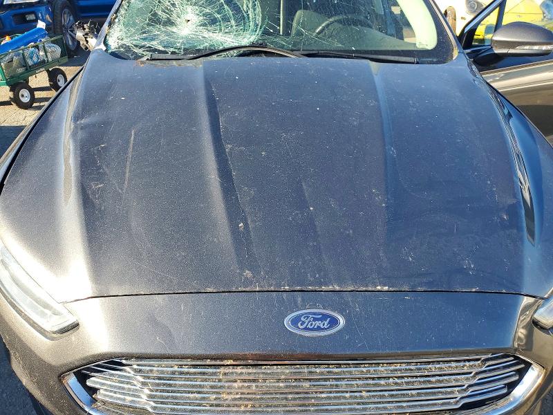 Photo 11 from auction – 2015 FORD FUSION with VIN 3FA6P0HD8FR243664