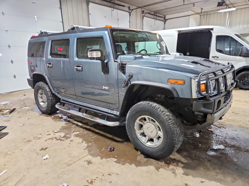Photo 4 from auction – 2006 HUMMER H2 with VIN 5GRGN23U46H121214