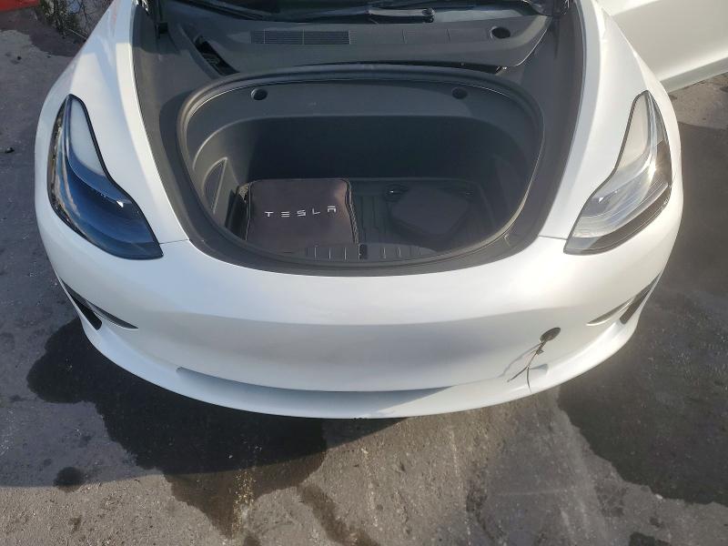 Photo 11 from auction – 2023 TESLA MODEL 3 with VIN 5YJ3E1EA4PF512720