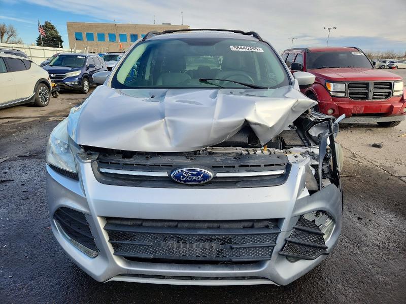 Photo 5 from auction – 2014 FORD ESCAPE with VIN 1FMCU9GX0EUA22116