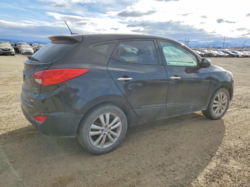 Photo 3 from auction – 2010 HYUNDAI TUCSON GLS with VIN KM8JUCAC8AU024300
