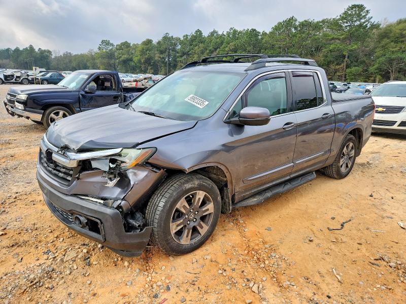 HONDA RIDGELINE 2017 with VIN 5FPYK2F62HB009274 - Photo from auction