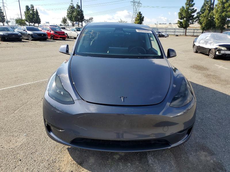 Photo 5 from auction – 2022 TESLA MODEL Y with VIN 7SAYGDEE0NA019618