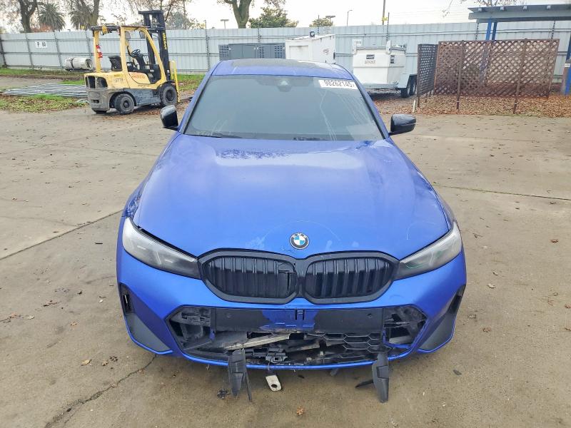 Photo 5 from auction – 2023 BMW 330I with VIN 3MW69FF01P8D43875