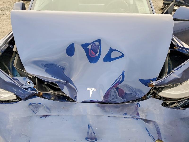 Photo 12 from auction – 2025 TESLA MODEL Y with VIN 7SAYGAEEXSF297083