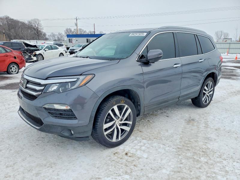 HONDA PILOT ELIT 2016 with VIN 5FNYF6H06GB110748 - Photo from auction
