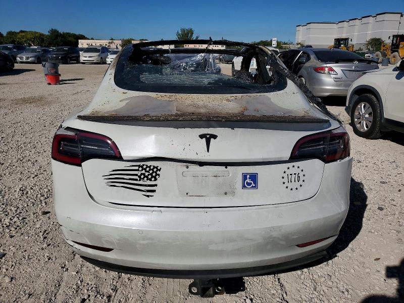 Photo 6 from auction – 2018 TESLA MODEL 3 with VIN 5YJ3E1EA1JF050348