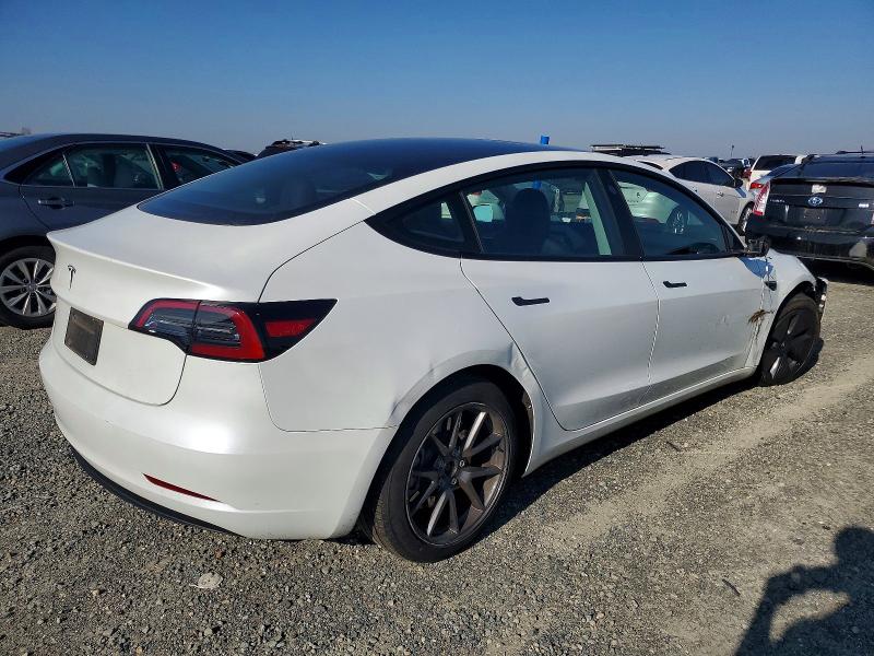 Photo 3 from auction – 2023 TESLA MODEL 3 with VIN 5YJ3E1EA6PF610325