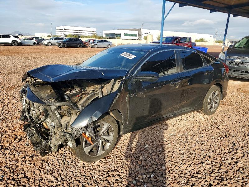HONDA CIVIC LX 2020 with VIN 19XFC2F62LE017919 - Photo from auction