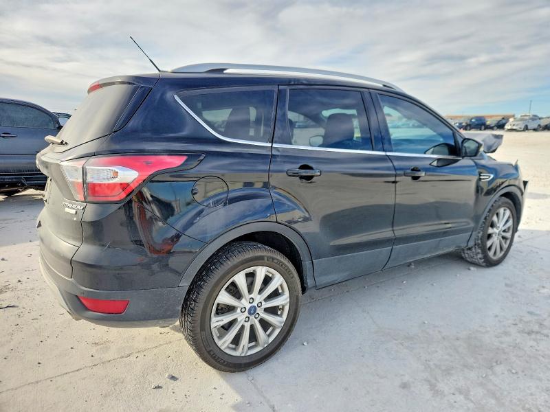 Photo 3 from auction – 2017 FORD ESCAPE with VIN 1FMCU0JD7HUD10570