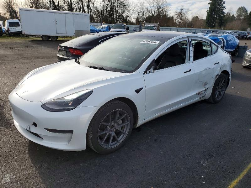 TESLA MODEL 3 2023 with VIN 5YJ3E1EA1PF455988 - Photo from auction