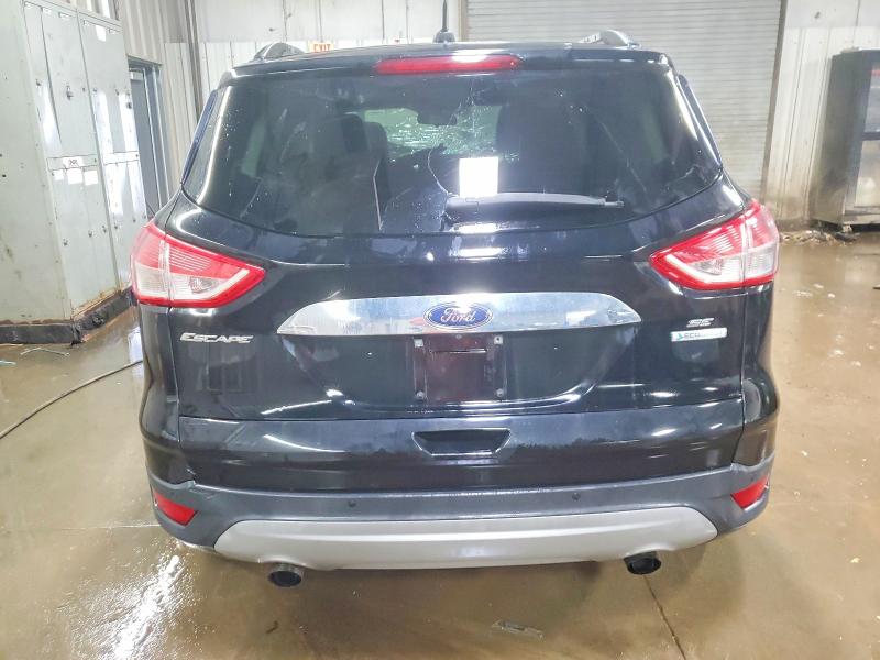 Photo 6 from auction – 2016 FORD ESCAPE SE with VIN 1FMCU0GXXGUB53987