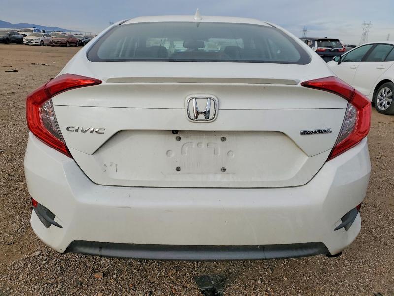 Фото 6 с аукциона – 2016 HONDA CIVIC с VIN 2HGFC1F92GH657693