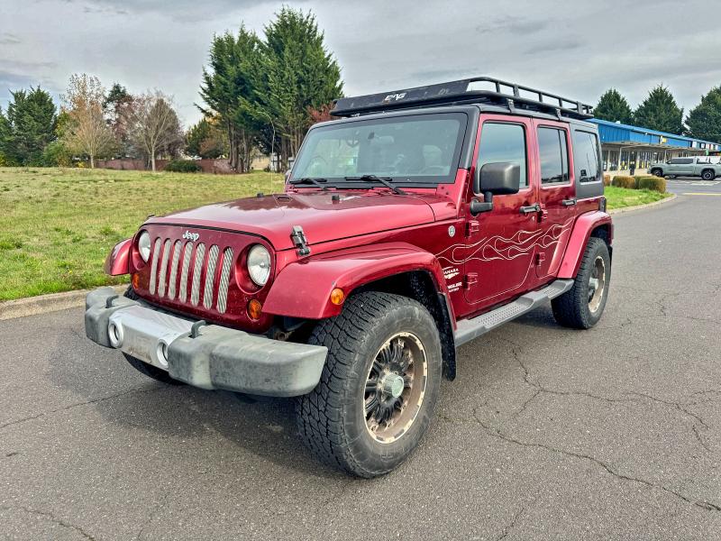 Photo 2 from auction – 2011 JEEP WRANGLER U with VIN 1J4BA5H17BL593450